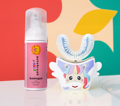 Automated toothbrush and toothpaste with unicorn design on a colorful background. #sonicprokidsbundle
